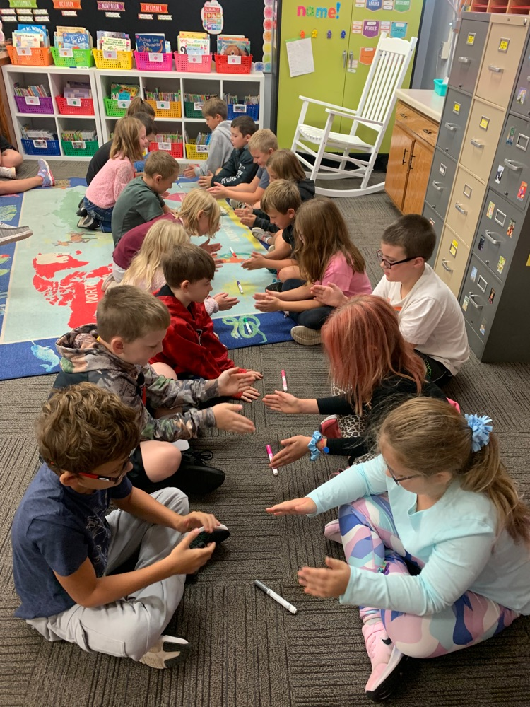 2nd graders playing Boom, Clap, Snatch 
